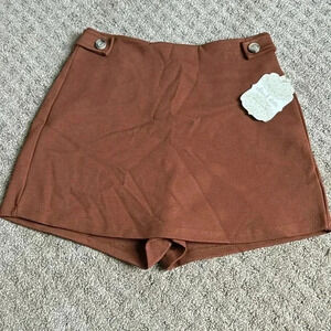 Altar’d State brand, size XS, color is brown.